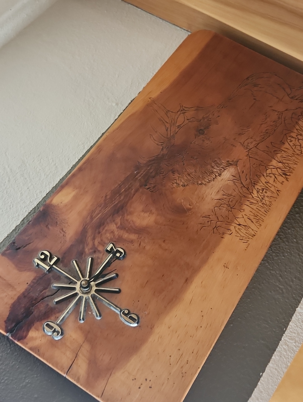Rustic Wood Wall Clock with Elk Engraving - Brown